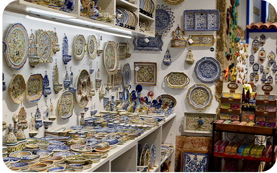 A room filled with lots of blue and white plates.