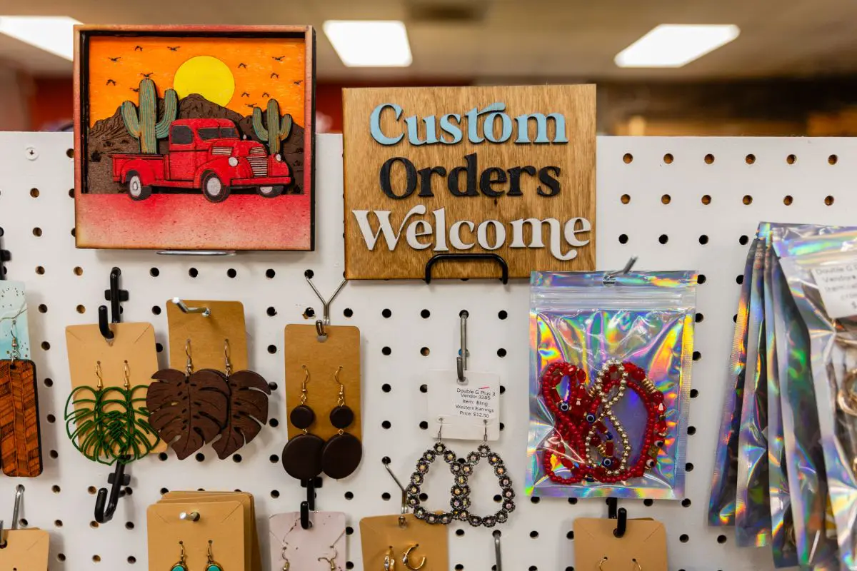 A display of jewelry hanging on the wall.