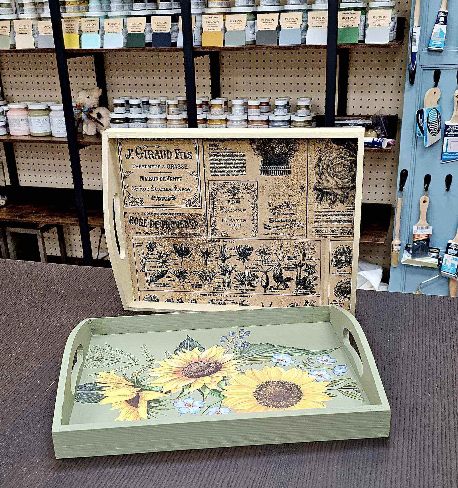 Sage green tray with sunflowers and vintage print.